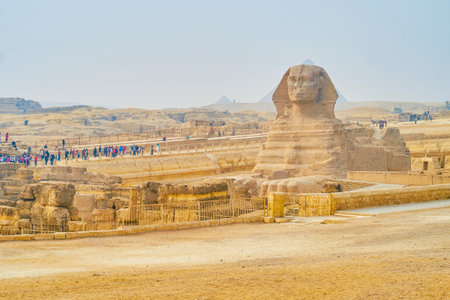 GIZA, EGYPT - DECEMBER 20, 2017: The crowds of tourists at the Sphinx viewing terrace in Giza...
