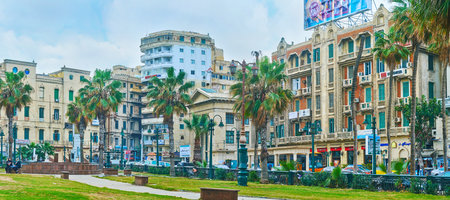 ALEXANDRIA, EGYPT - DECEMBER 19, 2017: Panorama of Saad Zaghloul square with historic housing and beautiful palm garden, on December 19 in Alexandria.のeditorial素材