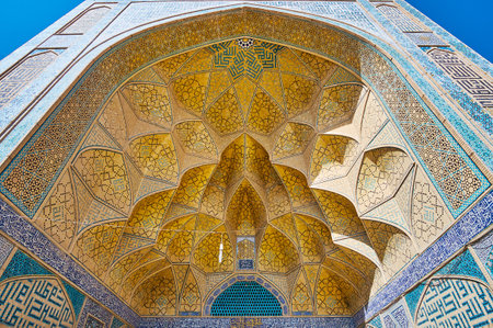 The stunning West portal of Jameh mosque with ornate tilling and muqarnas, Isfahan, Iran.のeditorial素材