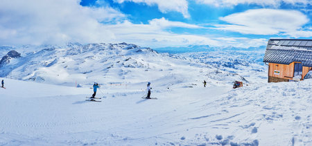 OBERTRAUN, AUSTRIA - FEBRUARY 21, 2019: Visit the mountain resorts of Salzkammergut, Dachstein-Krippenstein plateau is the paradise for skiers, boarders and snowshoers, on February 21 in Obertraun.のeditorial素材