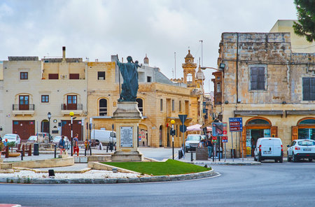 RABAT, MALTA - JUNE 16, 2018: The old Museum square separates two medieval Maltese cities - Rabat and Mdina, the statue of St Joseph decorates the square, facing old Rabat quarters, on June 16 in Rabat.のeditorial素材