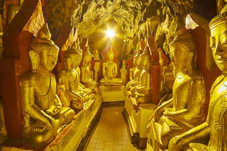 PINDAYA, MYANMAR - FEBRUARY 19, 2018:  The sacred Pindaya cave is notable worship site, place of pilgrimage and tourist landmark, famous for numerous statues and images of Buddha, preserved in its halls and corridors, on February 19 in Pindayaのeditorial素材