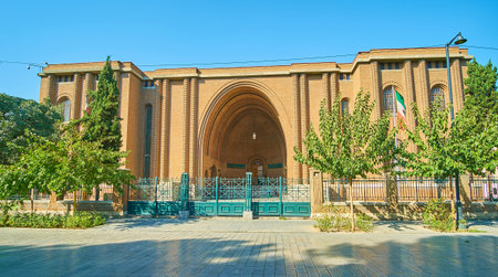 The brick edifice of Museum of Ancinet Iran - the part of National Museum of Iran, decorated with relief geometric patterns and scenic arched entrance, Tehranのeditorial素材