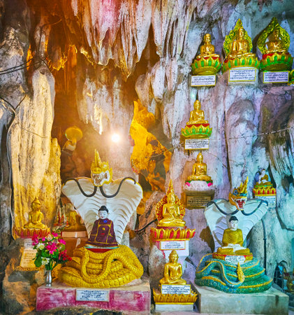 PINDAYA, MYANMAR - FEBRUARY 19, 2018:  The Naga-Raja Buddha statues decorate the shrine in stalactite Pindaya caveのeditorial素材