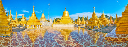 Variety of stupas in Nget Pyaw Taw Pagoda complex with different design, decorations and hti umbrellas, Pindaya, Myanmar.の写真素材