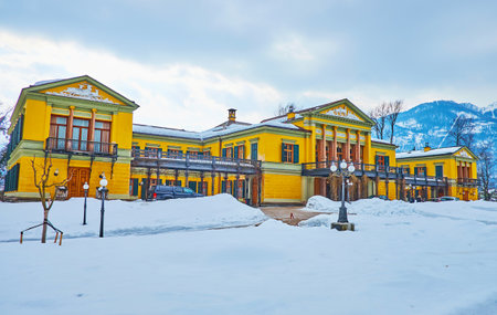 BAD ISCHL, AUSTRIA - FEBRUARY 20, 2019: Ornate Classic facade of Kaiservilla, decorated with slender pillars and animalistic reliefs, on February 20 in Bad Ischl.のeditorial素材