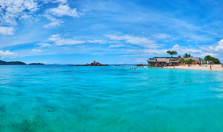 PHUKET, THAILAND - MAY 1, 2019: Khai Nai island boasts luxury sand beaches with clear emerald waters, idyllic landscapes and coral fishes of the local reef, on May 1 on Phuketのeditorial素材