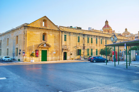 VALLETTA, MALTA - JUNE 19, 2018: The medieval building of former hospital, nowadays became Mediterranean Conference Centre, on June 19 in Valletta.のeditorial素材
