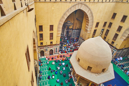 CAIRO, EGYPT - DECEMBER 22, 2017: The Muslim worshipers listen to the preaching in the courtyard of...