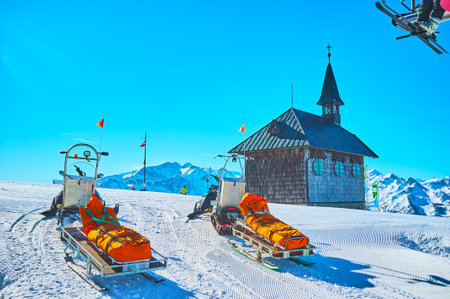 The rescue sleds, parked at the Elizabeth Chapel, located atop  the Schmittenhohe mount, Zell am See, Austriaのeditorial素材