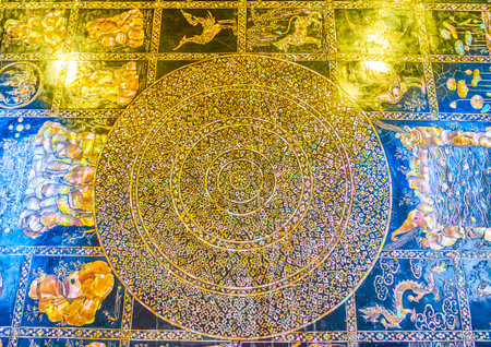 BANGKOK, THAILAND - APRIL 22, 2019: The close-up of the central part of pearl inlay of the soles of Lord Buddha, the circle represents the chakra or energy point, Wat pho temple, on April 22 in Bangkokのeditorial素材
