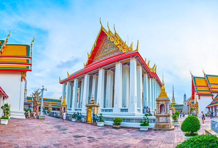 BANGKOK, THAILAND - APRIL 22, 2019: The panoramic  view on the facade part of Phra Ubosot shrine, the main temple in Wat Pho complex, also called the Ordination hall on April 22 in Bangkokのeditorial素材