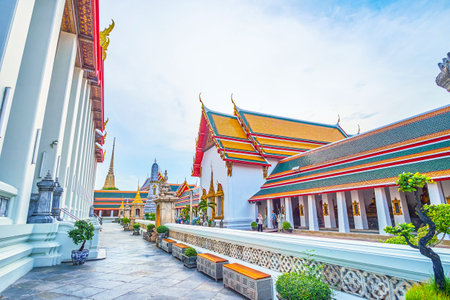 BANGKOK, THAILAND - APRIL 22, 2019: The surrounding balustrade of Phra Ubosot temple with shelves for shoes, before the entrance to the shrine, on April 22 in Bangkokのeditorial素材