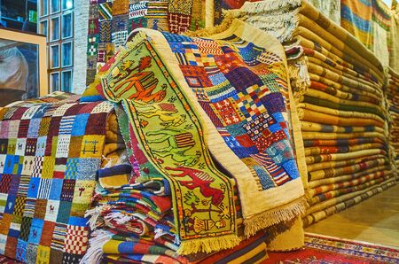 The rug store in Vakil Bazaar offers tradtional woolen carpets with colorful patterns, Shiraz, Iranの写真素材