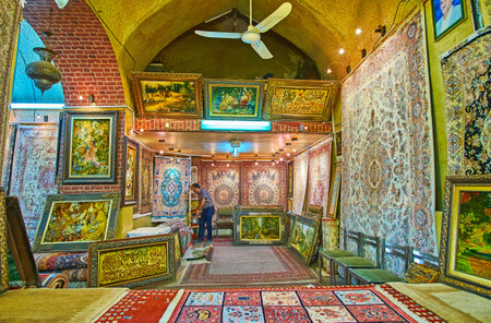 SHIRAZ, IRAN - OCTOBER 14, 2017: Walk the carpet section of Vakil Bazaar and enjoy traditional Persian carpets, woolen rugs, tapestries, Eastern kilims and other handmade souvenirs, on October 14 in Shiraz.のeditorial素材