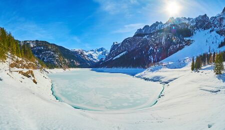 Fantastic Alpine scenery around the frozen Gosausee lake - the perfect place for the day walks on sunny winter weather, Gosau, Salzkammergut, Austriaの写真素材