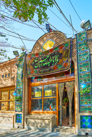 TEHRAN, IRAN - OCTOBER 25, 2017: The vintage facade of Azari Teahouse (chaykhaneh), located in shade of trees in Valiasr Avenue, on October 25 in Tehran.のeditorial素材