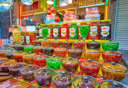 TEHRAN, IRAN - OCTOBER 25, 2017: Darband market stalls offer wide range of sun dried pickled fruits and beries (pineapple, peach, apricot, barberry) and lavashak fruit rolls, on October 25 in Tehranのeditorial素材
