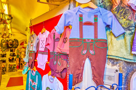 SALZBURG, AUSTRIA - FEBRUARY 27, 2019: The  baby men costume in traditional Austrian style at the shop in old town, on February 27 in Salzburgのeditorial素材