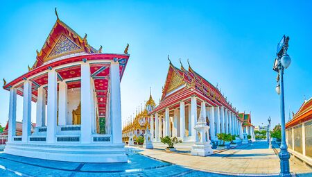 Panoramic view on the  temples of Wat Ratchanatdaram complex surrounding Loha Prasat with numerous golden spires, Bangkok, Thailandの写真素材