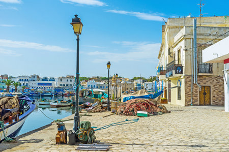 BIZERTE, TUNISIA - SEPTEMBER 4, 2015: Promenade around the harbor with a view on vintge...