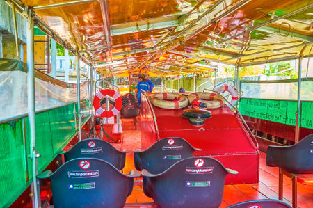 BANGKOK, THAILAND - APRIL 24, 2019: The empty ferry tourist boat standing at the ferry pier on Saensaeb canal, on April 24 in Bangkokのeditorial素材