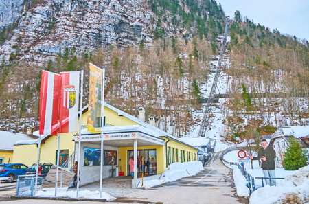 HALLSTATT, AUSTRIA - FEBRUARY 25, 2019: The lower station of Hallstatt Salt Mine Funicular (Panorama Lift), located at the foot of Salzberg mountain, on February 25 in Hallstattのeditorial素材