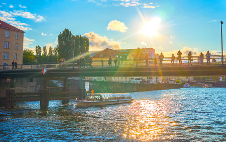 BERLIN, GERMANY - OCTOBER 3, 2019: The people walk on Berlin's Ebertsbrucke, making pictures and enjoying view of amazing architecture of historical neighborhood, on October 3 in Berlinのeditorial素材