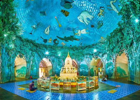 YANGON, MYANMAR - FEBRUARY 17, 2018: Panoramic interior of Mahavijaya (Maha Wizaya) Pagoda with colorful decorations in shape of trees and animals, on February 17 in Yangon.のeditorial素材