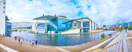 BERLIN, GERMANY - OCTOBER 3, 2019: Panoramic view on curve Spree river with modern Marie-Elisabeth-Luders-Haus government building on its bank, on October 3 in Berlinのeditorial素材