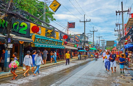 PATONG, THAILAND - MAY 1, 2019: The crowded Bangla Road, lined with popular tourist bars and restaurants, closed till night, on May 1 in Patongのeditorial素材