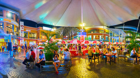 PATONG, THAILAND - MAY 1, 2019: Panorama of Jungceylon Shopping Center food court, decorated with giant sunshade and plants in pots, on May 1 in Patongのeditorial素材