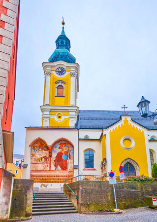 GMUNDEN, AUSTRIA - FEBRUARY 22, 2019: The historical Pfarrkirche (Parish Church) with medieval...