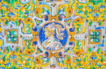 The amazing glazed tiled wall on Alcazar Palace complex depicting the face of the knight in armot...