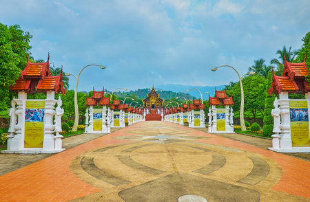 CHIANG MAI, THAILAND - MAY 7, 2019: The long alley with mosaic floor and many info stands leads to the Royal Pavilion of Rajapruek park, on May 7 in Chiang Maiのeditorial素材