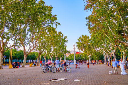 SEVILLE, SPAIN - OCTOBER 1, 2019: La Alameda square with large pedestrian area is one of the most beloved places for evening walks and the fine meeting point among cyclists, on October 1 in Sevilleのeditorial素材