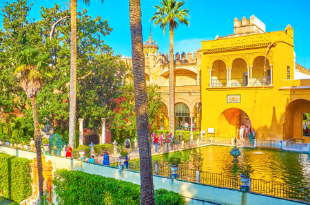 SEVILLE, SPAIN - OCTOBER 1, 2019: The small Mercury Pond is the most popular tourist destination in Alcazar Palace Gardensのeditorial素材