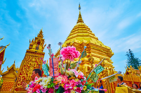 CHIANG MAI, THAILAND - MAY 7, 2019: The golden chedi (stupa) of Wat Phra That Doi Suthep temple with...