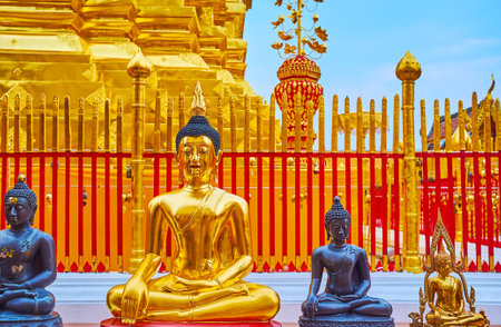 The line of Buddha Images in Touching Earth (Earth the Witness) gesture at the main chedi (stupa) of...