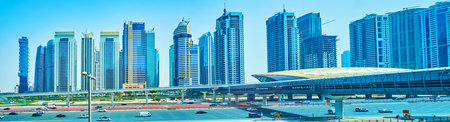 DUBAI, UAE - MARCH 2, 2020: Panorama of Sheikh Zayed road in district of Dubai Marina with a view on...