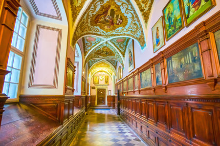 CZESTOCHOWA, POLAND - JUNE 12, 2018: The corridor in Jasna Gora monastery complex leading to Knight's Hal land decorated with historical frescoes and pictures, on June 12 in Czestochowaのeditorial素材