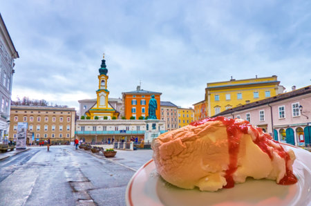 SALZBURG, AUSTRIA - MARCH 1, 2019: The famous Salzburger Nockerl dessert in outdoor cafe on Mozart Square in the heart of Altstadt district, on March 1 in Salzburgのeditorial素材