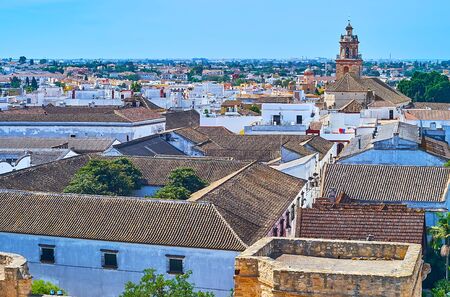 Aerial view of Bodegas Barbadillo winery roofs and bell tower of Our Lady of O church, rising over the city, Sanlucar, Spainの写真素材