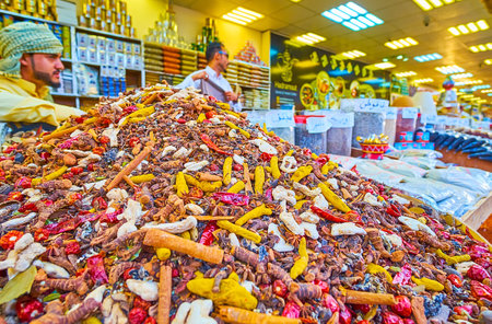 DUBAI, UAE - MARCH 5, 2020: The heap of colored spices, including cinnamon, pepper, ginger, star anice in Yemen pavilion of Global Village Dubai, on March 5 in Dubaiのeditorial素材