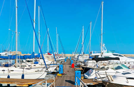 The modern sailing yachts moored in Venetian port of Chania, Crete, Greeceの写真素材