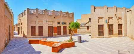 Panorama of the narrow streets, tiny yards and restored clay houses of Al Shindagha neighborhood, Dubai, UAEの写真素材