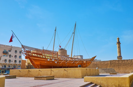 Area in front of historic Al Fahidi Fort is decorated with installtion of traditional dhow boat, Dubai, UAEのeditorial素材