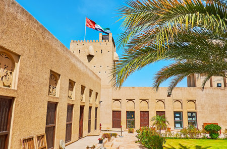 The scenic court of History Museum with a view on adobe walls and the old watch tower, Al Shindagha neighborhood, Dubai, UAEのeditorial素材