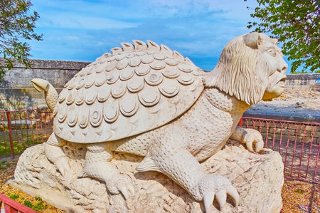 The statue of the medieval mythological creature of Tarasque with lion head, turtle-shell, 6 paws, bear claws and dragon tail, Tarascon, Franceのeditorial素材