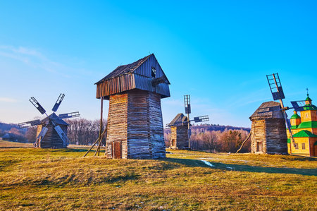Explore traditional timber windmills of Polissya Region in Pyrohiv Skansen, Kyiv, Ukraineのeditorial素材